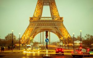 Eiffel Tour view from the street up to half way. Luminated.